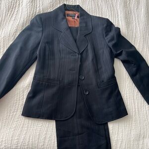 Kasper black suit.